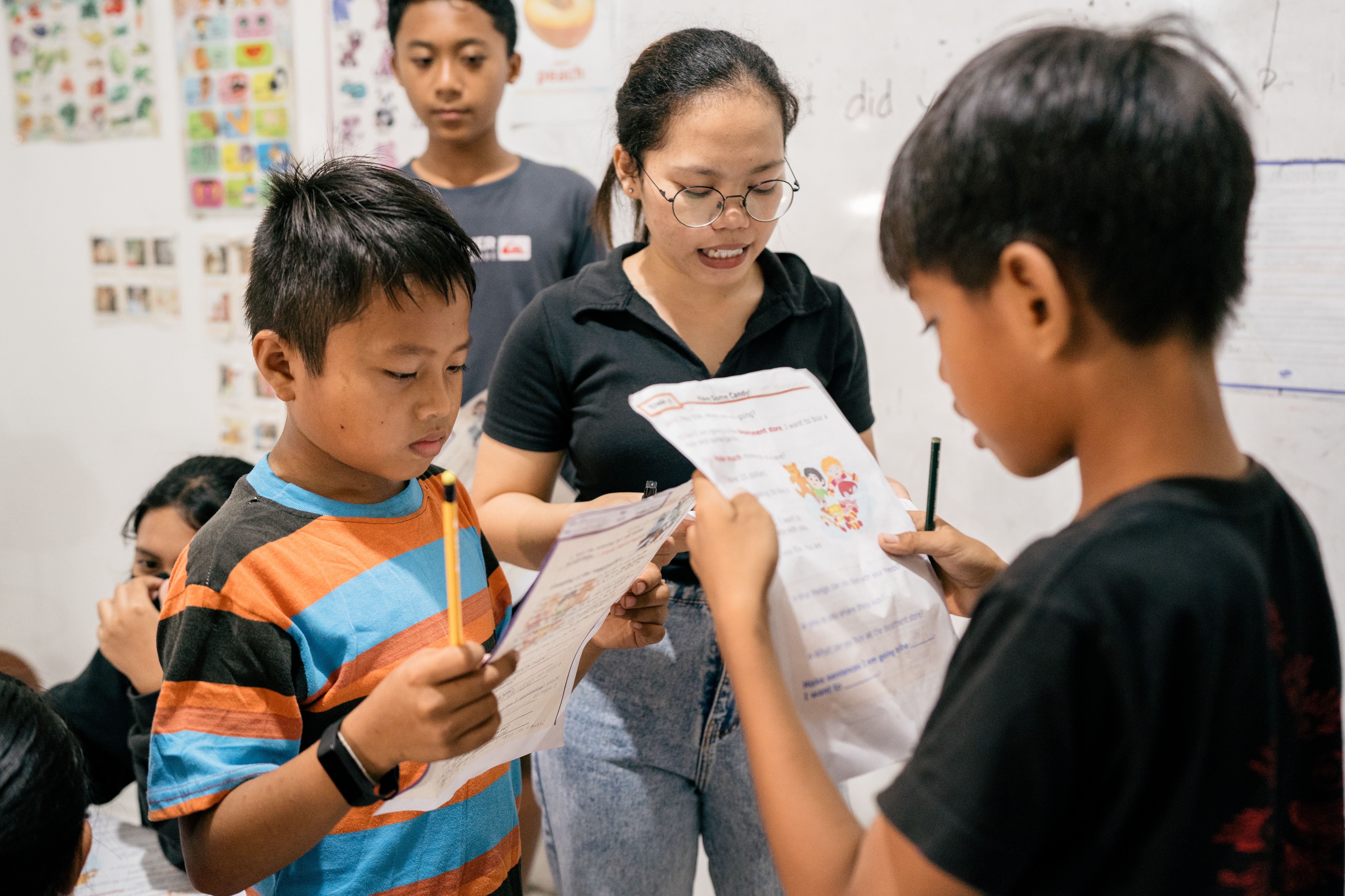 Children learning with educational supplies and books